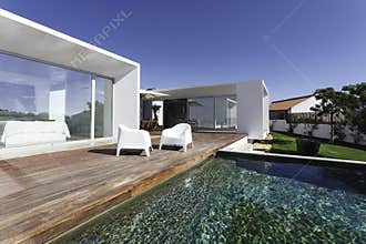 House with garden swimming pool and wooden deck