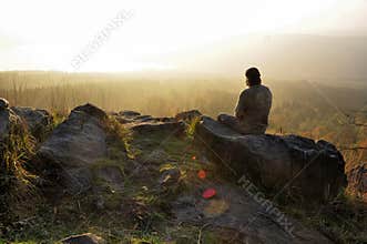 Man and sunrise