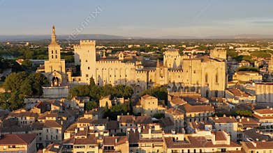 View of Avignon with Palais des Papes during sunset in Southern France. Medieval architecture along the Rhone River in Avignon,