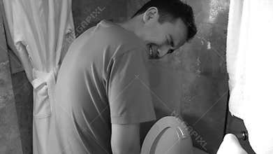 Young man having a painful urination. Urinary track infection. Prostatitis