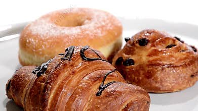 Pastry. Breakfast. Various products. Doughnut, croissant, brioche.