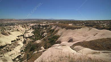 Cappadocia fairy chimneys and sculpted volcanic landforms appear in Turkiye, badlands, geology, rock formations, volcanic tuff