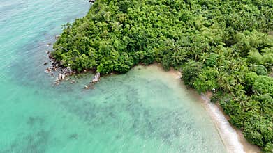 Push-in Bird-eye view over the diverse coastline of Northern Palawan, Philippines. The dro