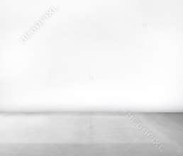 Room Made of White Wall and Concrete Floor