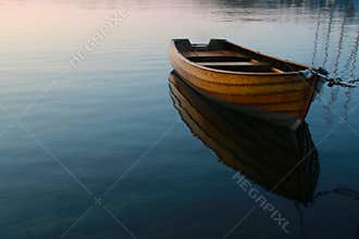 Row boat in calm water