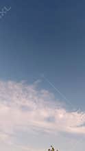 Blue sky with soft white clouds and copy space, clean background texture