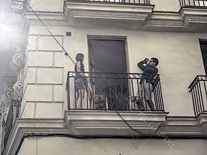 People going about their daily lives in the streets of the city of Valencia