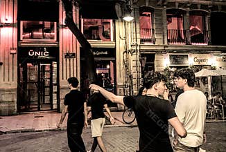 People going about their daily lives in the streets of the city of Valencia