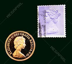 UK purple stamp with portrait of Elizabeth II and 1980 Australian Gold sovereign on black background