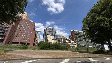 Modern mixed use city skyline with brick and glass high rises beside
