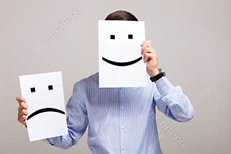 Man changing his mood from bad to good