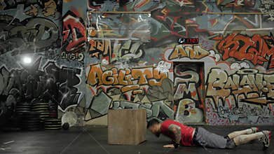 Young Athlete Man Doing A Box Jump Exercise In The Gym crossfit
