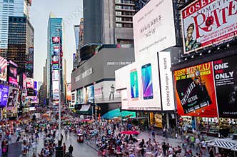 Times Square timelapse full of people and commercials mid day