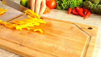 Cutting Yellow Pepper In Slow Motion