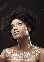 Portrait of African American woman in gold