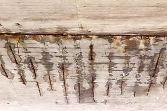 Corrosion of the concrete structure of the bridge due to the precipitation and chemical reagents.