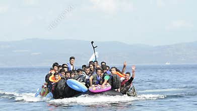 Refugees arriving in Greece in dinghy boat from Turkey.