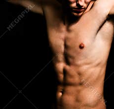 Artistic image of muscular man body