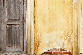 Old moldy red-brick wall