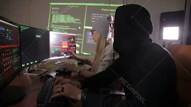 The hacker team breaking security system. Cybercrime, cyber security concept.