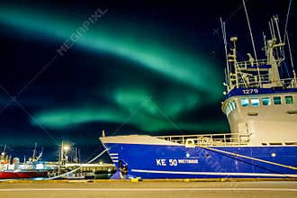 Aurora borealis over Reykjavick boat harbour