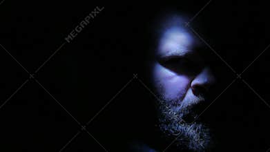 Depressed man in the darkness: depression, sadness, sad, loneliness. 4K UHD