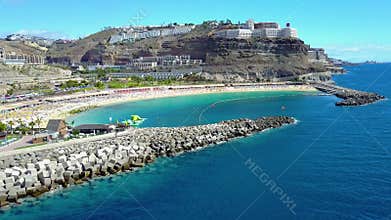 Flying over the beautiful Amadores beach at Gran Canaria