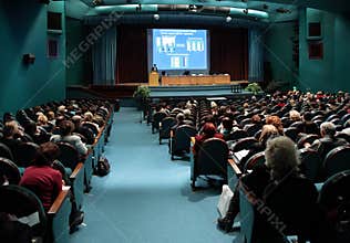 Conference in auditorium