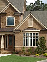 Luxury Model Home Exterior front door bay window