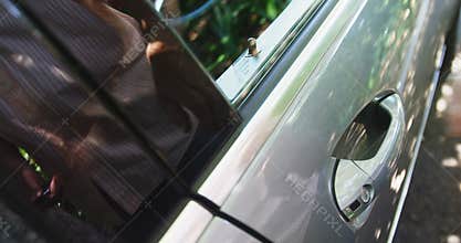 Man opening car door