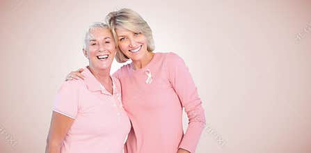 Composite image of portrait of happy daughter with mother supporting breast cancer awareness