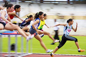 Women's 100 Meters Hurdles Action (Blurred)