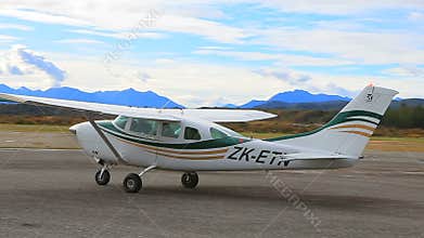 HOKITIKA NEW ZEALAND - SEPTEMBER 3,2015 : wilderness wing cessna 206 traveling plane taxi to runway in hokitika airport