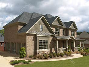 Luxury Model Home Exterior stormy weather angle