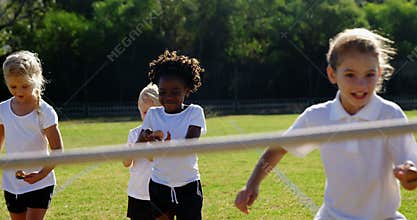 Children playing lemon and spoon race