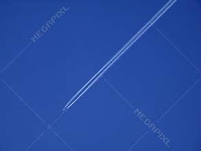 Jet airliner in blue sky