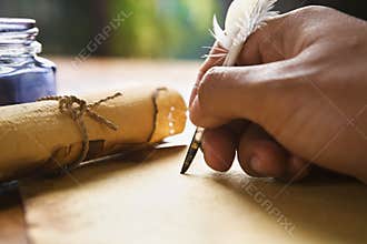 Hand writing using quill pen