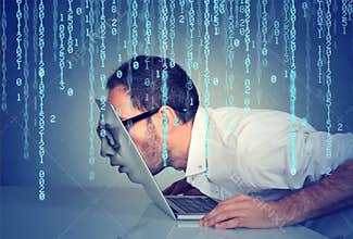 Business man with his face passing through the screen of a laptop on binary code background