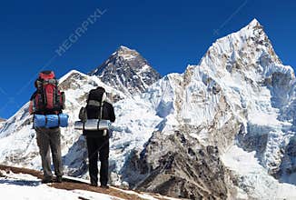 Mount Everest from Kala Patthar with two tourists