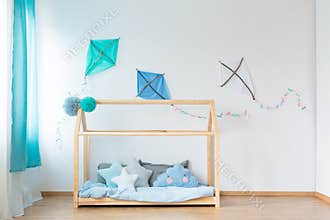 Bed with star shaped pillows