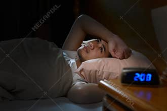 Depressed man suffering from insomnia