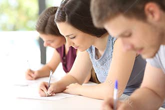 Students doing an exam in a classroom