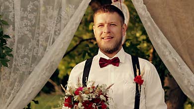 The groom is waiting for the bride HD video