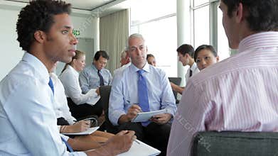 Groups Of Businesspeople In Brainstorming Meetings