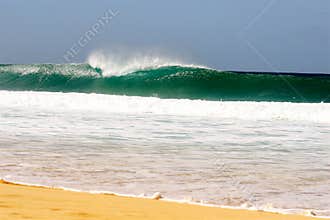 Wave breaking on sandy beach