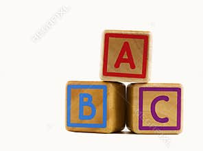 Wooden cubes marked A, B and C
