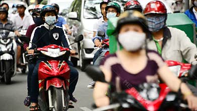 Moped Traffic in Downtown Ho Chi Minh City Daytime - Vietnam