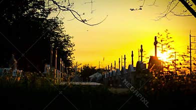 Christian cross under sunset