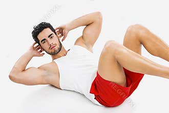 Athletic man doing ABS