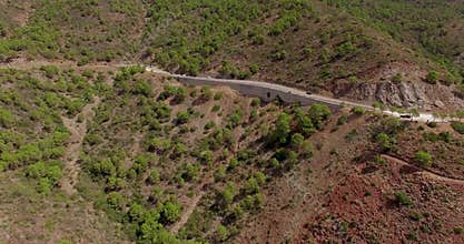 Aerial. Flight Over Curvy Road in Mountains